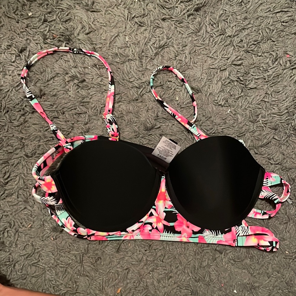 Super fun black and floral bathing suit top.